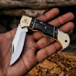 Handmade High Carbon Steel Pocket Knife with Brass & Black Bull Horn Handle – Leather Cover, Razor Sharp Blade